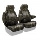 Mossy Oak seat covers installed on a 50/50 bucket row with non-removable headrests